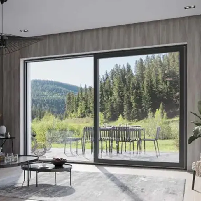 Große SMART-SLIDE-Terrassentür mit dunklen Rahmen und breiter Verglasung als Zugang zur Terrasse mit Blick in den Garten